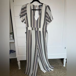 Size 5 Crystal Sky Black, white, and tan striped Jumpsuit